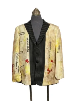 Front view of a tailored blazer showcasing two external waist pockets and a sharp lapel.