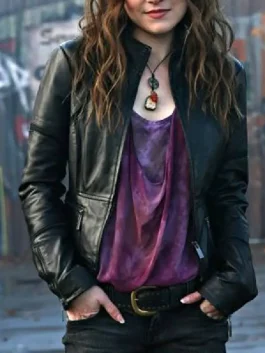 Meg Masters leather-style jacket highlighting the detailed craftsmanship and vintage aesthetic.