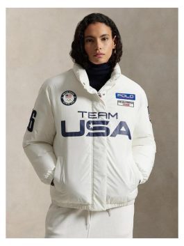 Front-side view of the Team USA 2026 white puffer jacket with signature patriotic graphics.