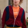 Haley Lu Richardson as Twila in the official 2026 Ponies red zip-up jacket.