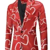 Hearts Printed Red Blazer showcasing a vibrant holiday aesthetic and a high-quality fabric drape for a premium ensemble.
