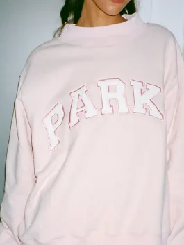 Front view of a Valentines Day Varsity Mockneck Sweatshirt showing the collar and button details.