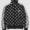 A trendy adidas polka dot jacket with a sporty fit and a timeless graphic aesthetic.