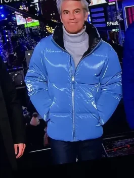 Andy Cohen blue puffer jacket New Year 2026 full front view showing a warm, clean winter fit.