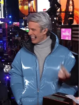 Styling close up of Andy Cohen blue puffer jacket New Year 2026 showing collar and front detail.