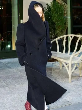 A front view of the Emilia Clarke Blue Hooded Coat with a large cozy hood and deep pockets.