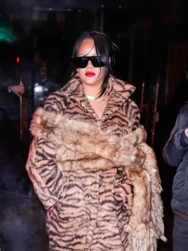 Rihanna wearing a bold Rihanna Tiger Print Coat with a striking Tiger Print.