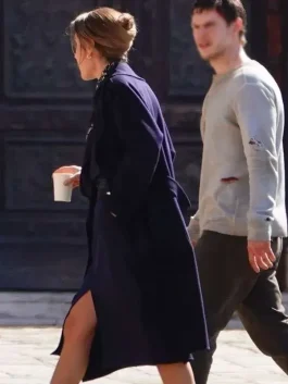 Rebecca Hall wearing the iconic Rebecca Hall Blue Coat in a scene from the 2026 series.
