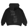 A unisex Tell Her You Love Her Hoodie featuring a bold message and a comfortable oversized fit.