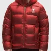 Front view of the Team Canada Red Puffer Jacket with a secure zip closure and insulated hood.