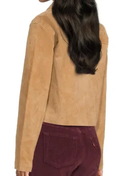 Back view of women's cropped brown suede jacket showing clean seams and smooth leather finish.