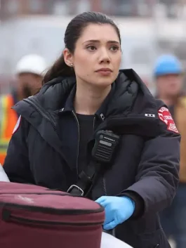 Front view of a Violet Mikami Blue Jacket with the signature Chicago Fire department emblem.