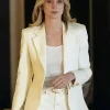 A stylish Elizabeth Debicki White Blazer with structured shoulders and a bright ivory finish.