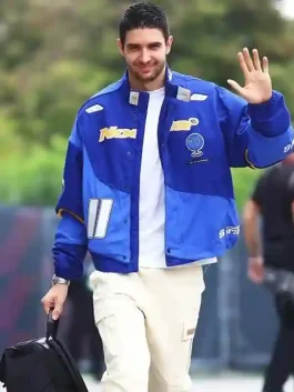 A stylish Esteban Ocon Blue Nike Nocta Jacket with elastic cuffs and striking yellow and white racing graphics.