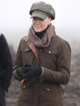 A stylish Kate Middleton Brown Cotton Jacket featuring utility pockets and a stand up collar.