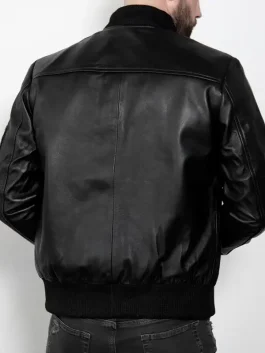 The back view of a Mens Premium Black Leather Bomber Jacket showing a clean and smooth surface.