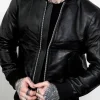 A classic Mens Premium Black Leather Bomber Jacket with a durable texture and athletic fit.