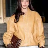 A stylish NYFW Emilia Mernes Brown Leather Jacket with a soft viscose lining and multiple pockets.