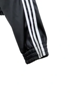 Premium streetwear jacket with iconic ribbon fastening