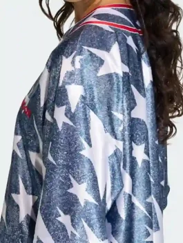 A side profile of the Adidas Denim Graphic Baseball Jersey showing the smooth polyester build and clean blue finish.