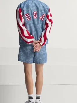 The back view of the Adidas Denim Graphic Track Top showing the clean seams and premium blue denim texture.