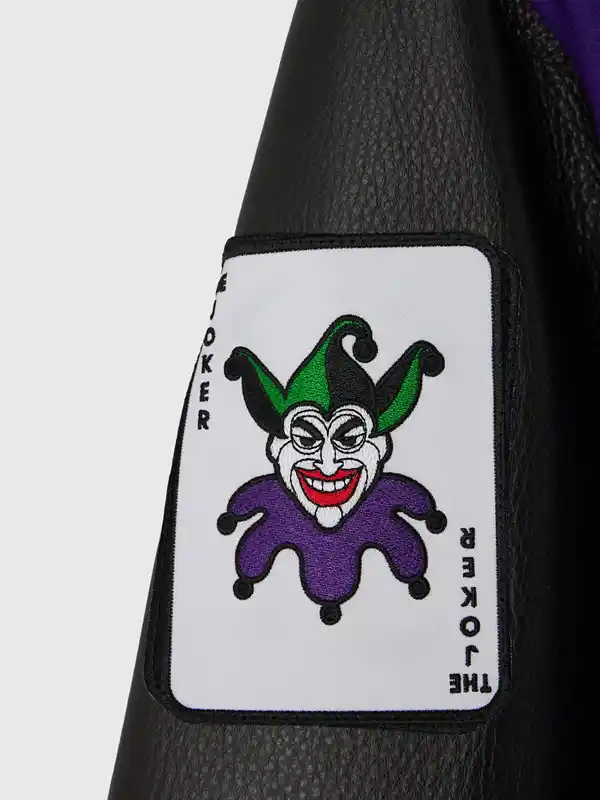 Batman X The Joker Split Varsity Jacket in purple black with classic varsity style