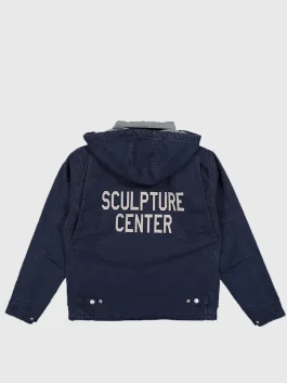 The back view of the Carhartt New Balance Hooded Jacket showing the premium navy blue cotton and precision stitching.