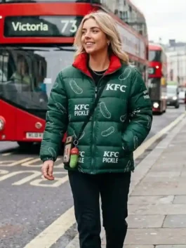 Front profile of the Pickle Puffer Jacket in green parachute fabric with a stand up collar and integrated hood.