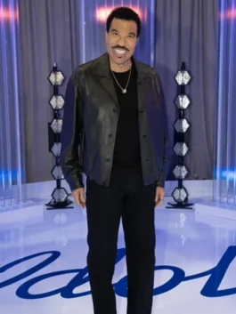 Close-up of a high-quality leather jacket featuring a structured collar and front buttons.