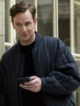 Nick Gehlfuss CIA 2026 Bill Goodman Black Quilted Bomber Jacket with clean TV series style.