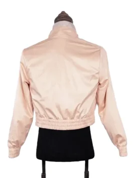 Lightweight sport fusion jacket with full-length sleeves and detailed fabric overlays.