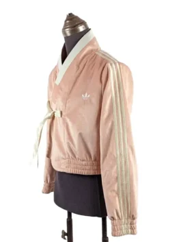 Traditional eastern-inspired athletic jacket featuring Hanbok-style patterns and floral embroidery.