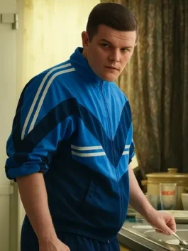 Robert Aramayo blue track jacket with casual movie-inspired outerwear look.