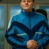 Robert Aramayo I Swear John Davidson Blue Track Jacket with clean sporty styling.