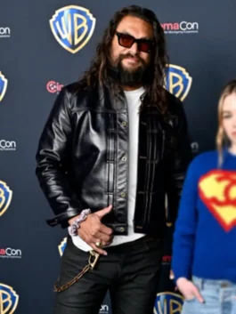 Close-up of a high-quality leather jacket featuring chest pockets and a structured fit.