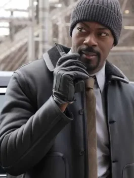 A man in a sophisticated leather jacket featuring a soft lining and front button closure.