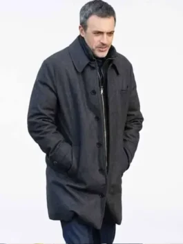 A man in a high-quality wool coat with a professional shirt-style collar.