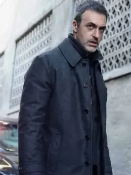 Detective Vincent Riley inspired long wool coat featuring a buttoned front closure.