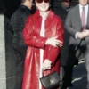 Meryl Streep red leather long coat with polished celebrity fashion appeal.