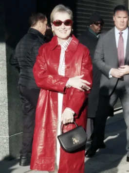 Meryl Streep red leather long coat with polished celebrity fashion appeal.