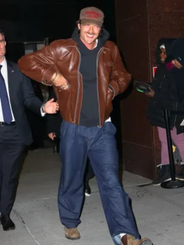 Close-up of the rich texture and buttoned cuffs on a celebrity-inspired leather jacket.