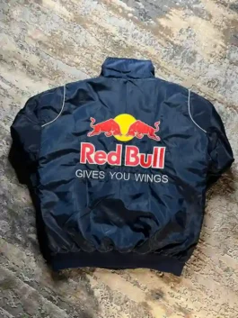 Close-up of a professional racing jacket with a stand-up collar and ribbed cuffs.