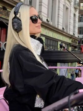 Black satin jacket inspired by Paris Hilton Spring Campaign 2026 fashion.