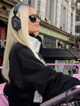 Black satin jacket inspired by Paris Hilton Spring Campaign 2026 fashion.