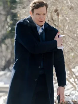 CIA 2026 Bill Goodman black coat with polished wool outerwear look.