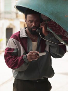 Yahya Abdul-Mateen II multicolor jacket with statement streetwear-inspired outerwear look.