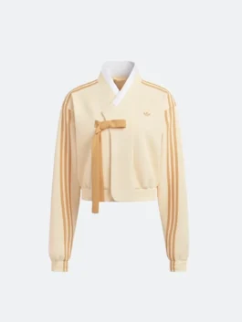 Front view of the TWICE x Adidas Hanbok Cream Yellow Fusion Jacket.