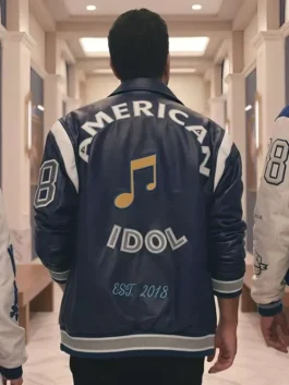 Back view of Lionel Richie blue varsity jacket with America Idol graphic and music note detail