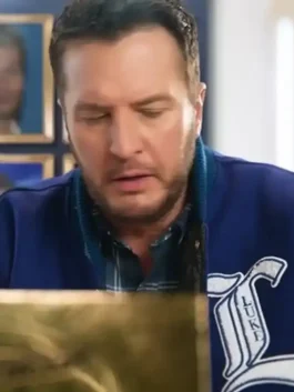 Close-up of Luke Bryan blue varsity jacket with front chenille patch and ribbed collar detail