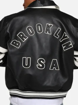 Back view of Mens AVIREX Brooklyn Leather Jacket with Brooklyn USA lettering and ribbed waistband